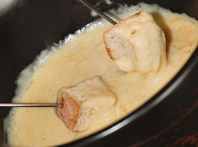 Restaurante LUGANO Fondue, Pasta y Risotto